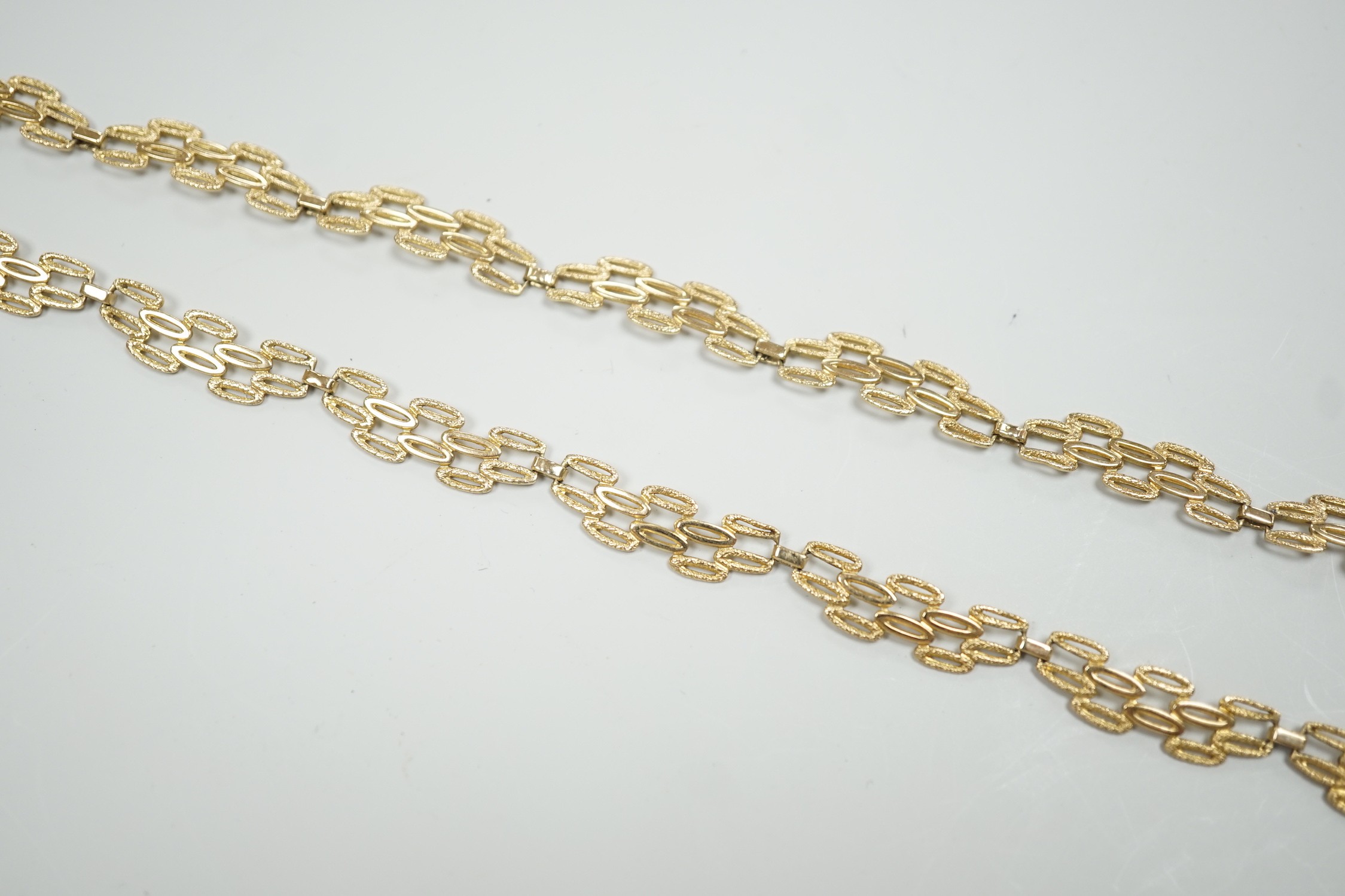 A 9ct gold pierced fancy link necklace, 45cm, 11 grams.